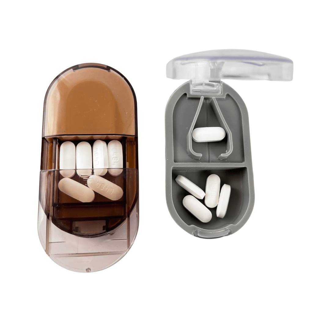 Built-in pill storage compartment in brown portable medicine tablet splitter for travel use
